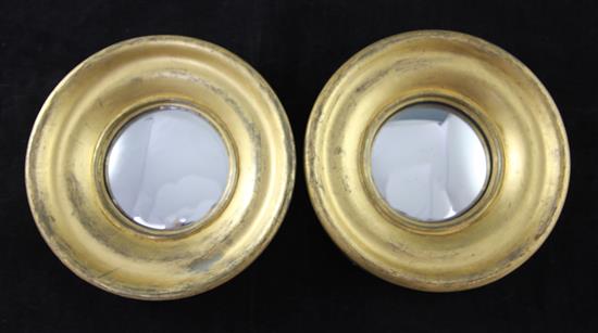 A pair of Victorian convex glass wall mirrors, Diam. 9in.